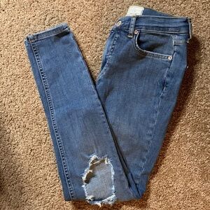 Free People jeans, size 25R, distressed knees. Skinny cut. Good condition.